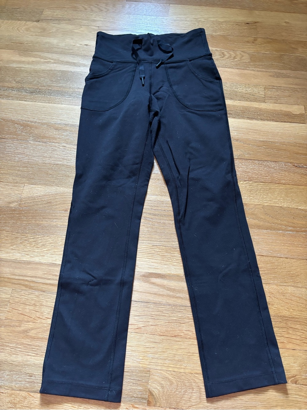 Lululemon Women’s Still Pants Size 4 Black Stretch Waist Pockets Pull On Yoga